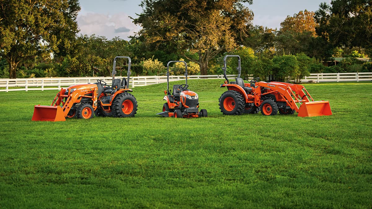 A lineup of Kubota tractors